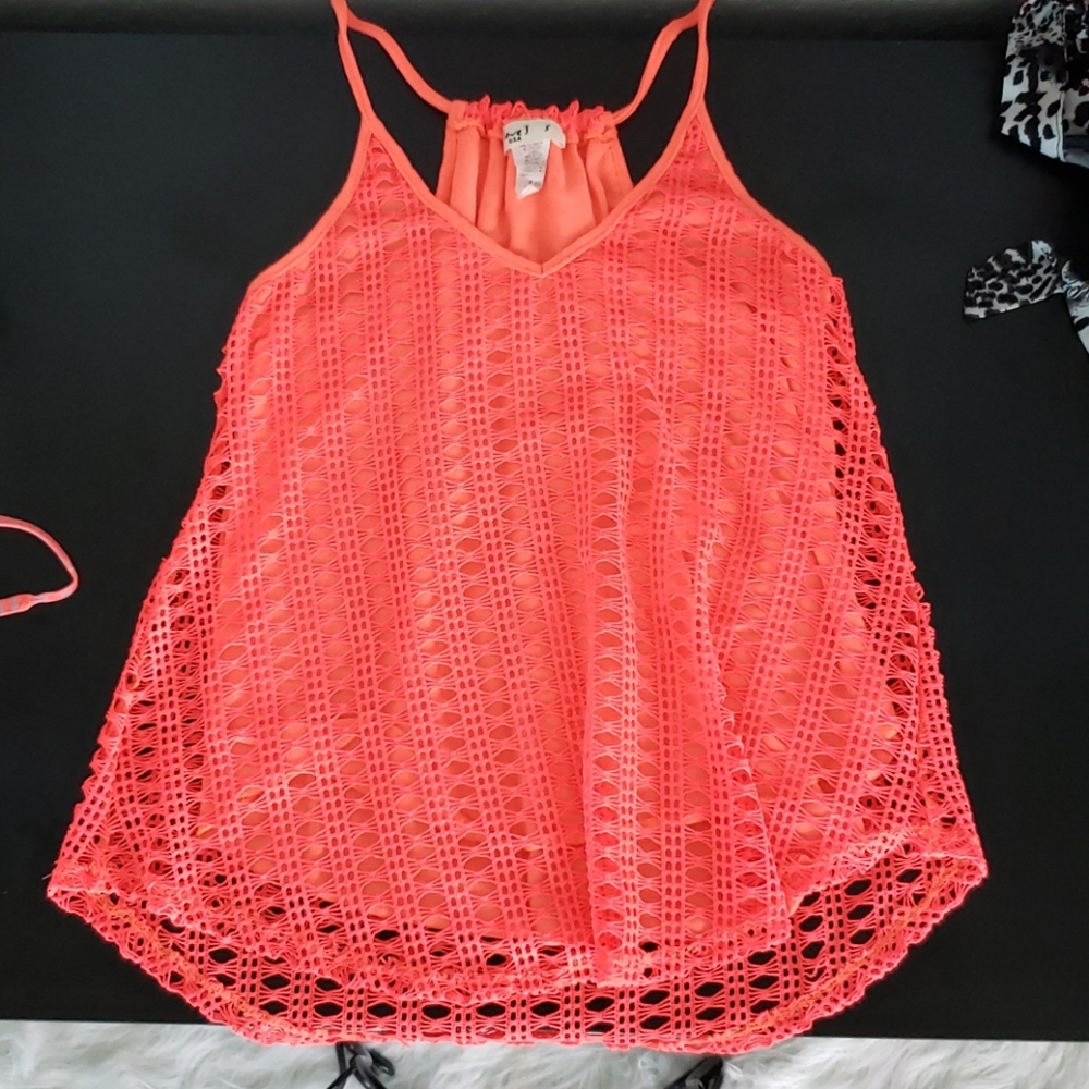 A peachy tank top.